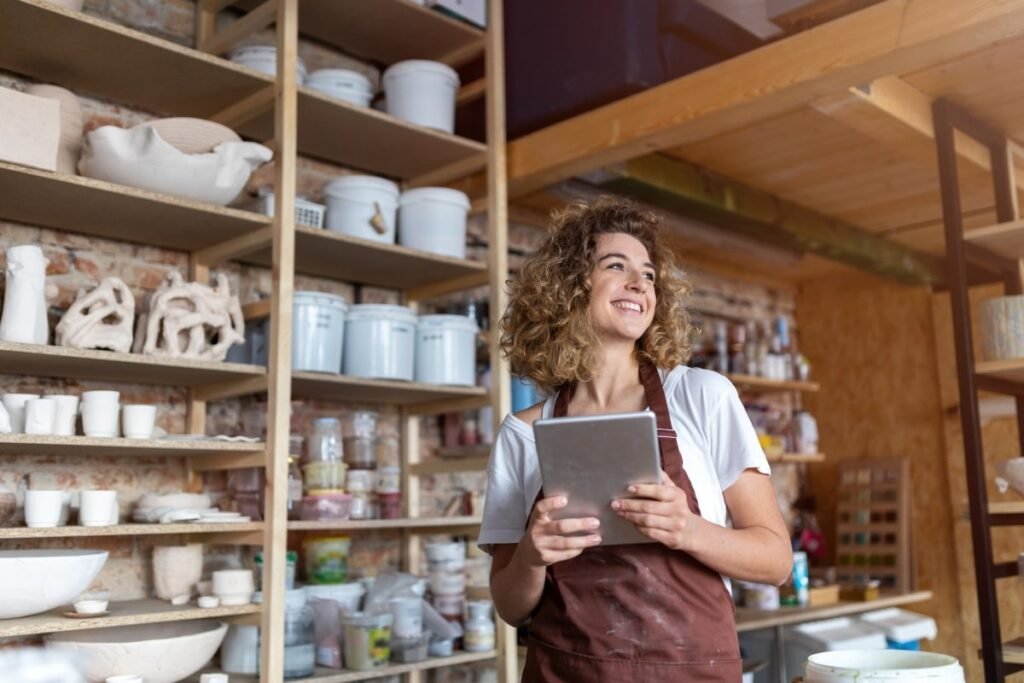 Self Employed (Solo 401k), represented by an image of a craftswoman with tablet computer